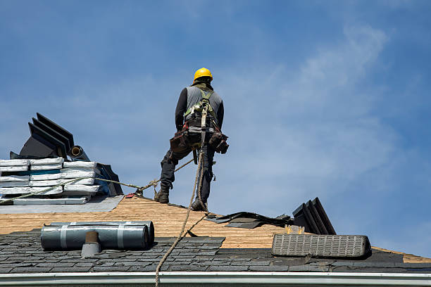 Professional Roofing technician working in Glasgow, OR